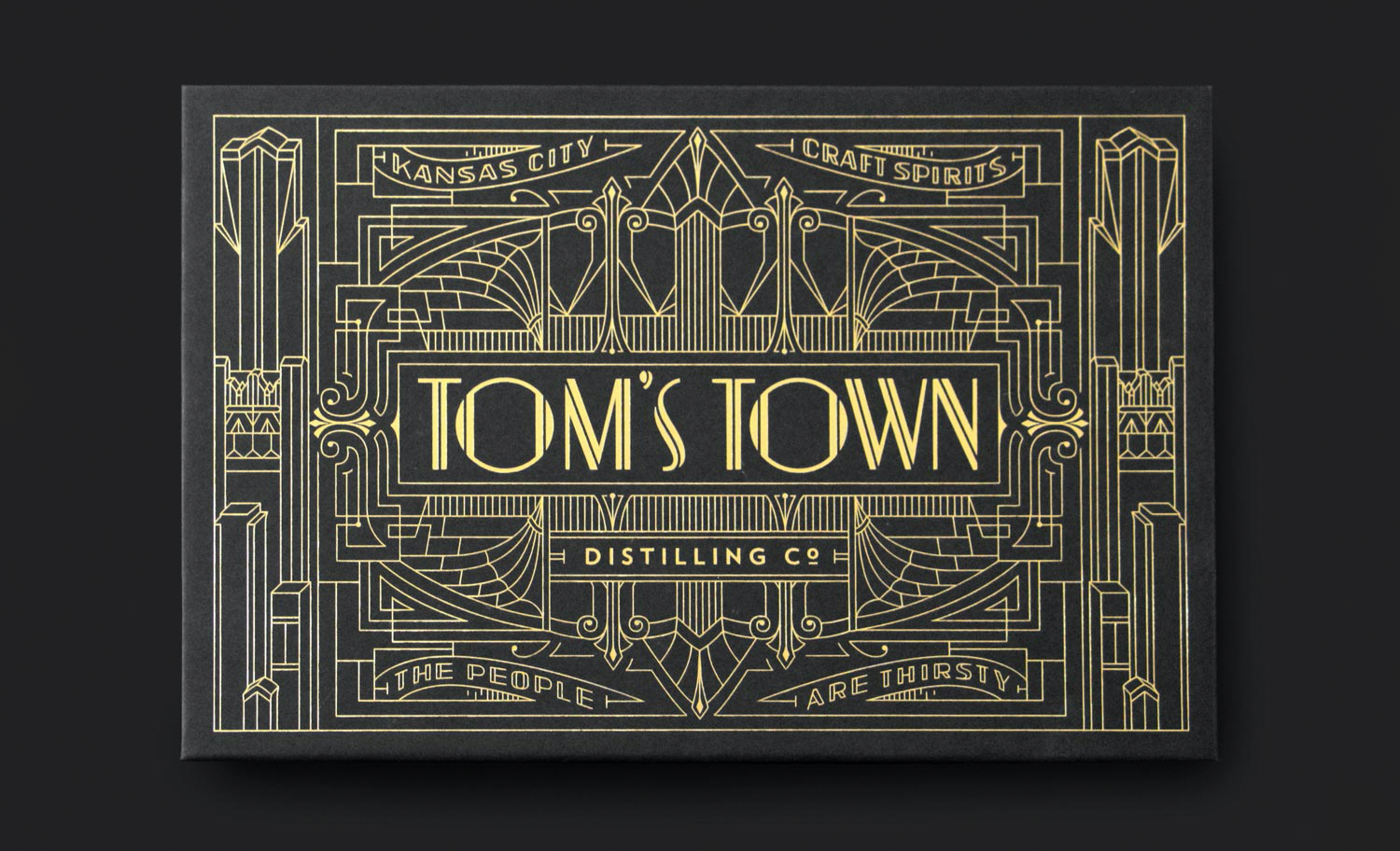 Tom's Town Distilling Co: Spirits Branding Logo